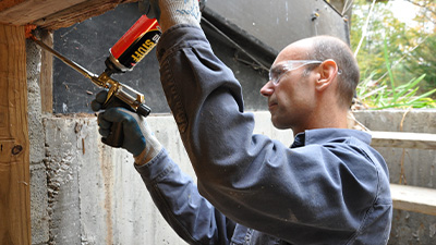 photo of weatherizing the outside of a house